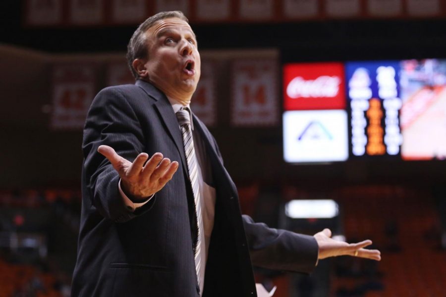 Rice head coach Scott Pera shows his frustration as  his team struggled from the field in the first half.