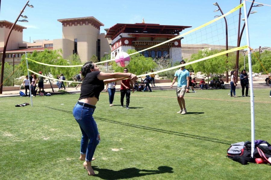 Students play volleyball at the first Miner Fest  on Wednesday, April 18 at Centennial Plaza. 