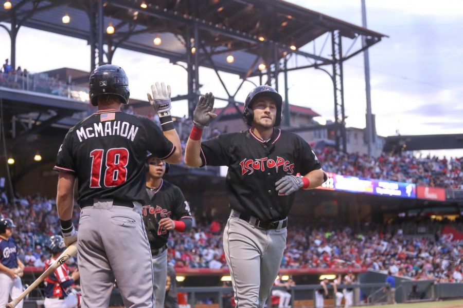 The Isotopes  celebrates as they beat the Chihuahuas 11-5 Tuesday, July 3 at Southwest University Park.