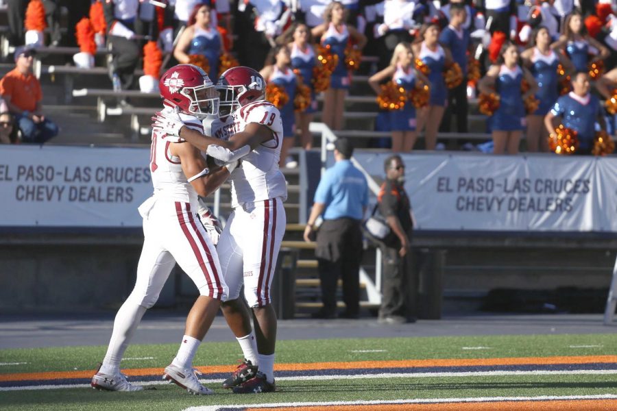 NMSU celebrates after a block punt that they took to the end zone. 