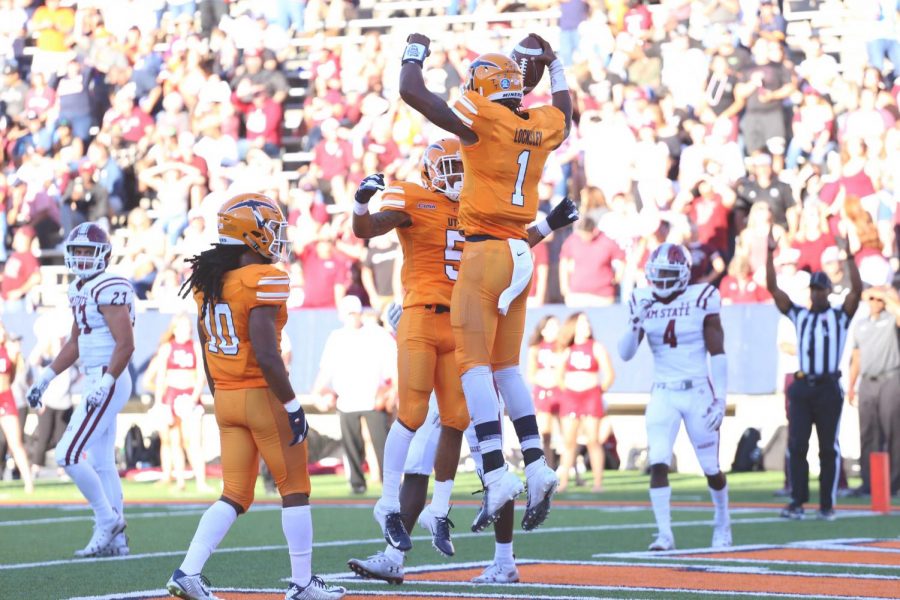 Junior wide receiver Keynan Foster and junior Quarterback Kai Locksley celebrate as UTEP tied the game at seven. 