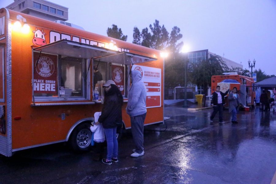 Food was available for purchase in the food truck section despite the rainy weather at the first day of Chalk the Block on Friday night.