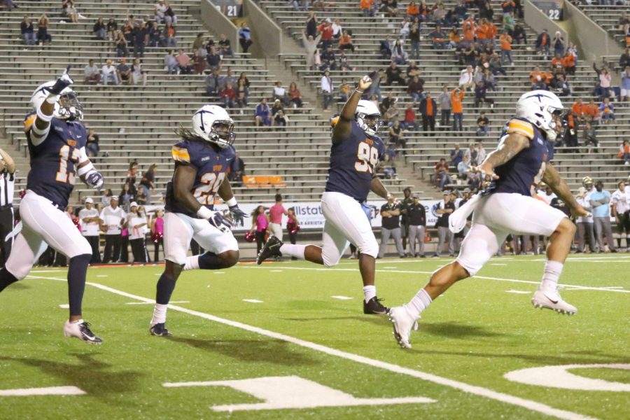 Graduate transfer A.J. Hotchkins celebrates after his goal line stance against UAB. 