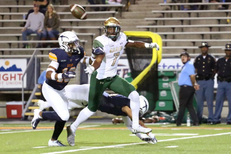 UAB's senior wide receiver Xavier Ubosi fails to make the catch in double coverage, Saturday, Oct. 27,  at the Sun Bowl.  