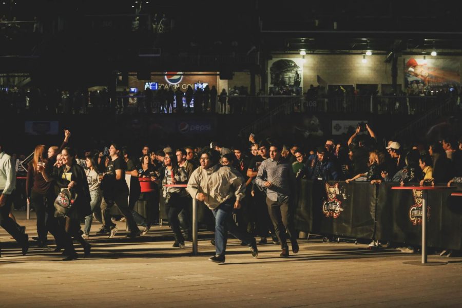 Democratic challenger O'Rourke's supporters run to the front of the stage before O'Rourke takes the stage at his watch party on Tuesday, Nov. 6 at the Southwest University Park. 