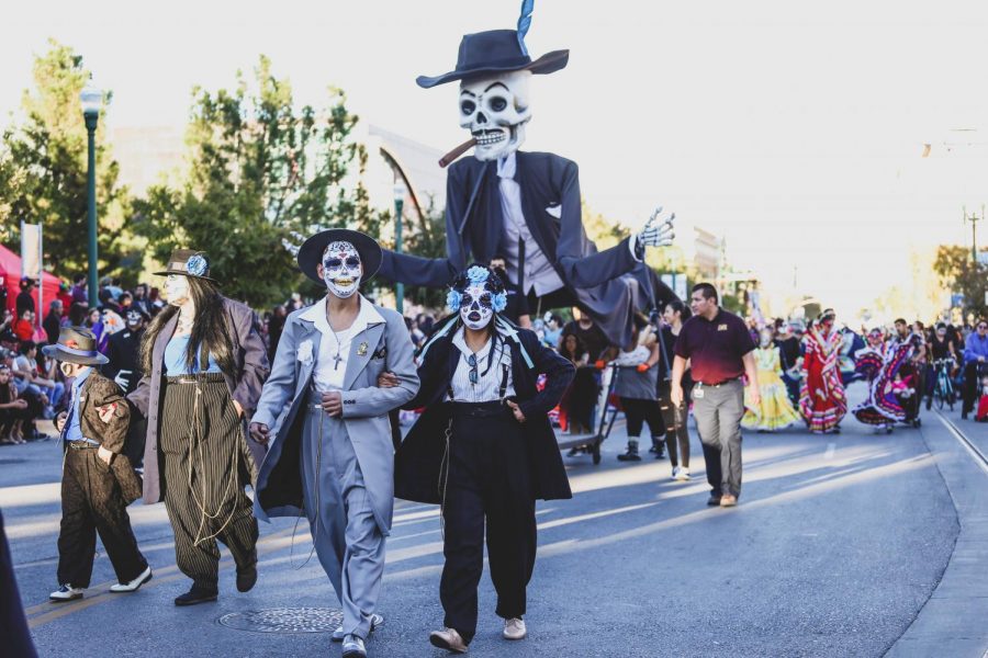 Attendees dress with traditional Mexican clothings and paint their face as catrinas to celebrate the Day of the Dead on Saturday, Nov. 3 at Down Town El Paso. 