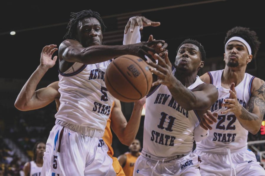 The Aggies catch the rebound at a game against the Miners at NMSU on Friday night, Nov. 9.