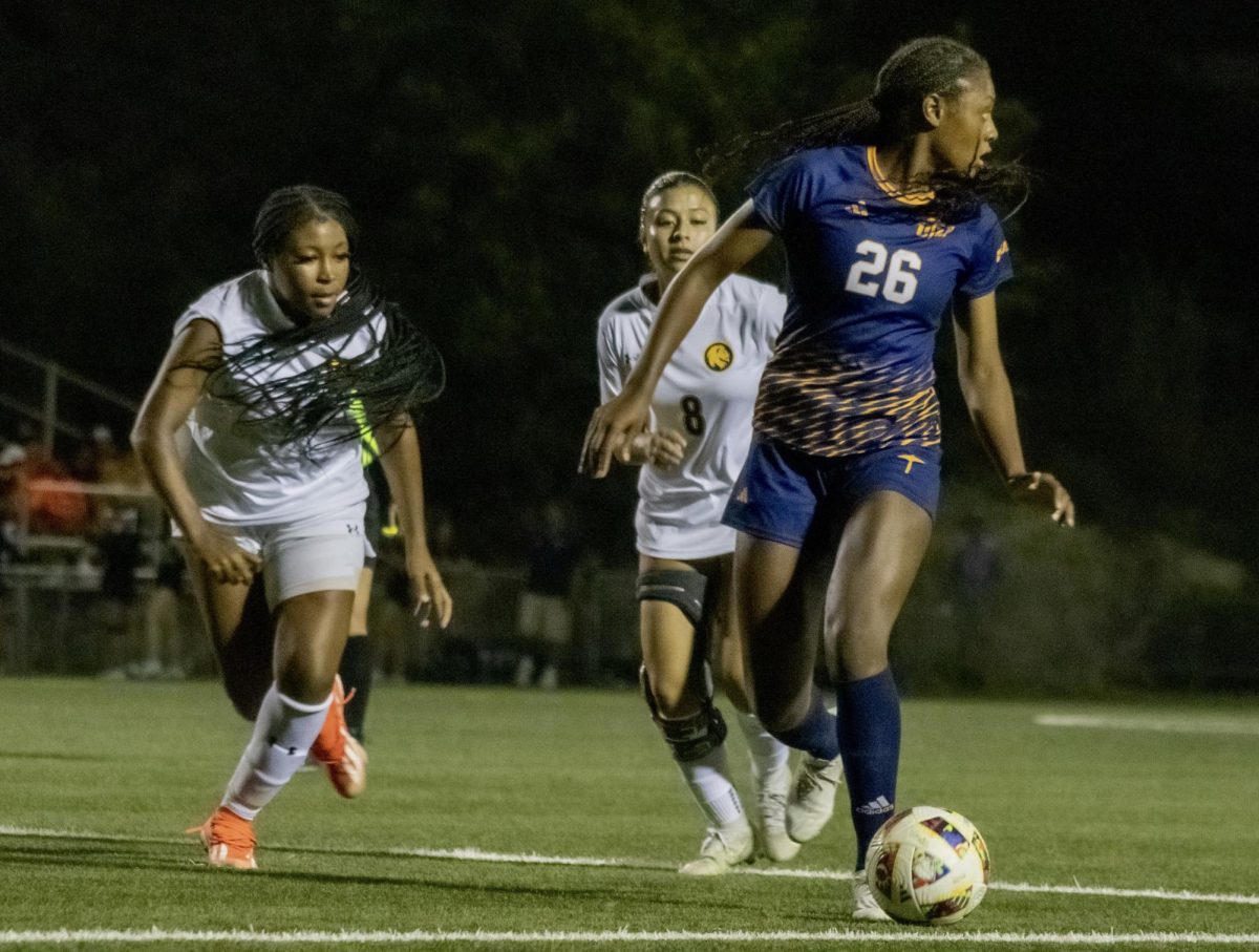 Senior forward Hayden McMillan in possession of the ball against Texas A&M-Commerce on Aug. 22.