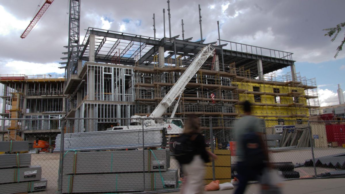 The new Liberal Arts building under construction is located behind theoriginal Liberal Arts building.