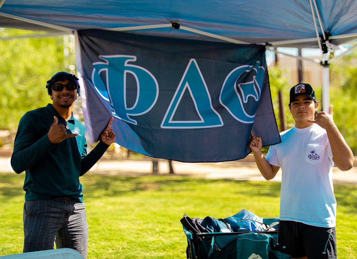 Roman Gomez and Sergio Sanchez representing Phi Delta Theta.