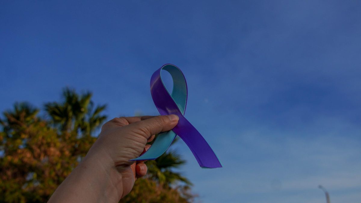 Blue and violet ribbons symbolize Suicide Prevention Awareness Month.