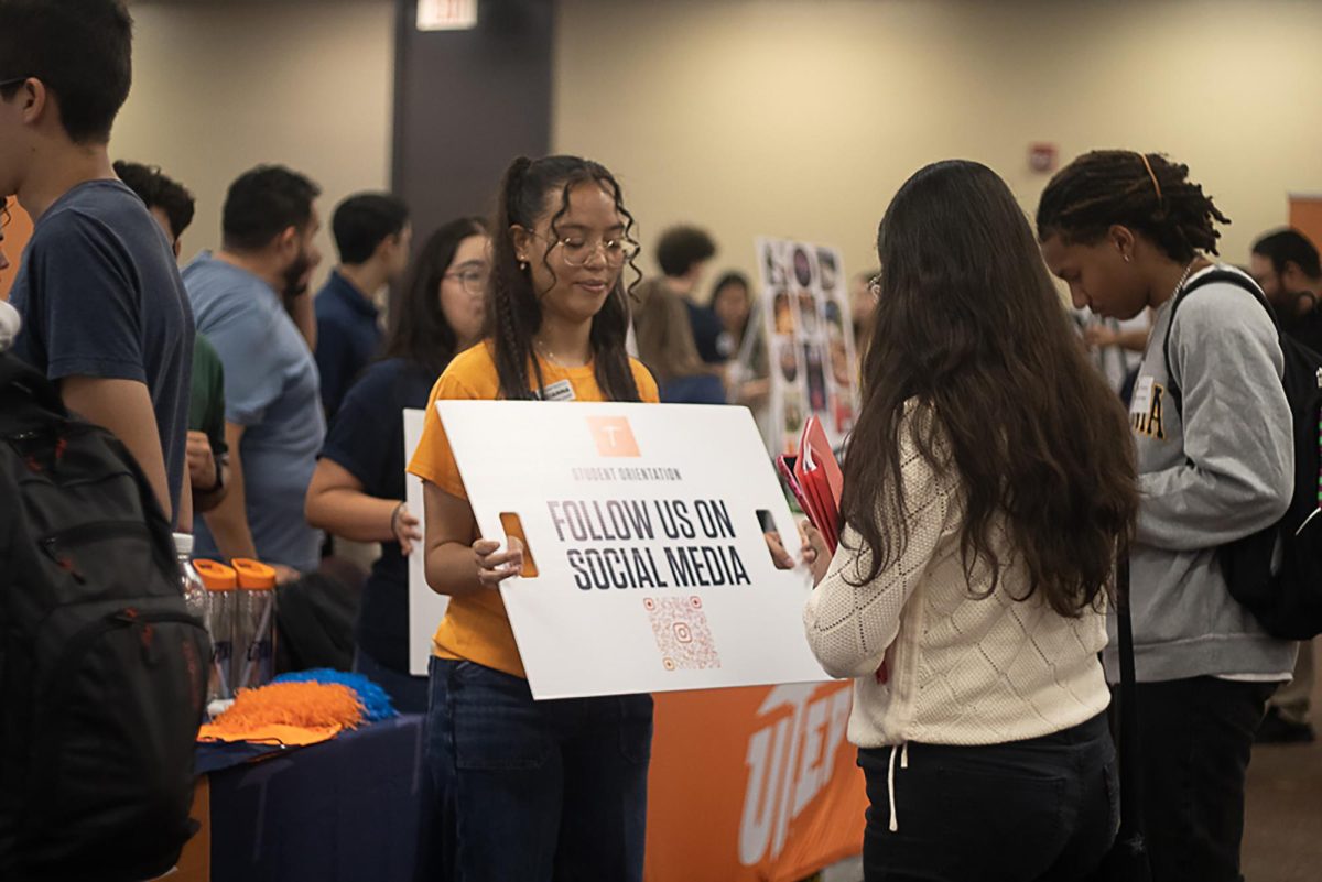 Members of UTEP Student Orientation group encourage students to join their organization at the Work at UTEP Job Fair.