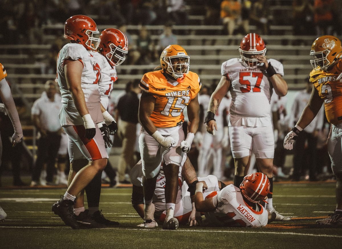 Defensive End Bryton Thompson celebrates after a play.