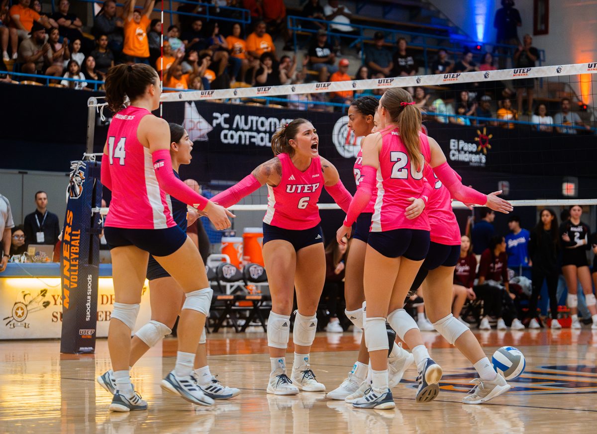 Outside Hitter Torrance Lovesee celebrates a point against NM State.