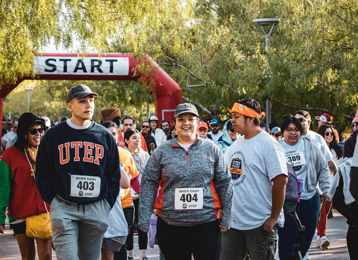 Participants begin the Miner Dash 3k Walk at Centennial Plaza.