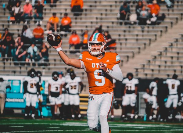 Quarterback Skyler Locklear setting up a pass to a teammate in the game against Kennesaw State.