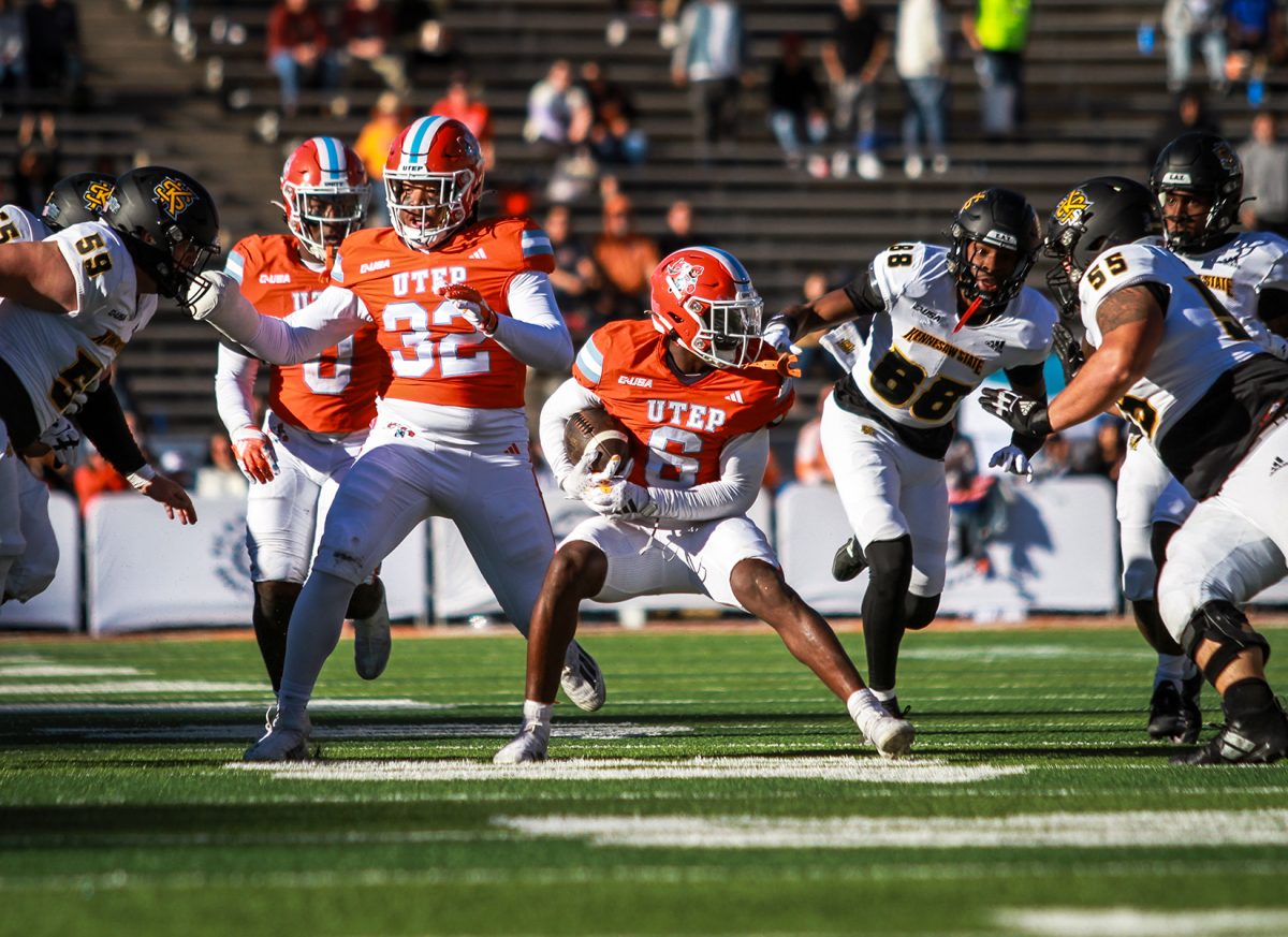 Wide Receiver Kenny Odom saves the ball.