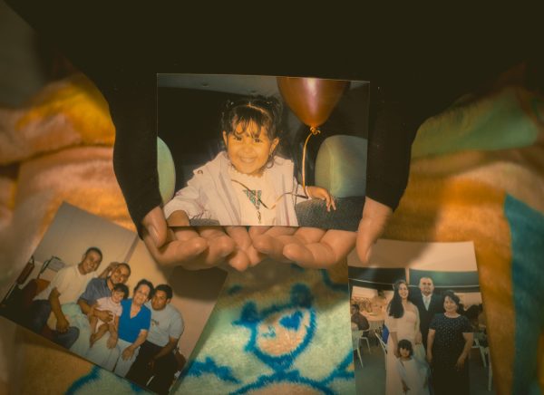 Aneley Muñoz with her childhood photos and blanket as she takes time to reflect on her relationship with Spanish as an adult.