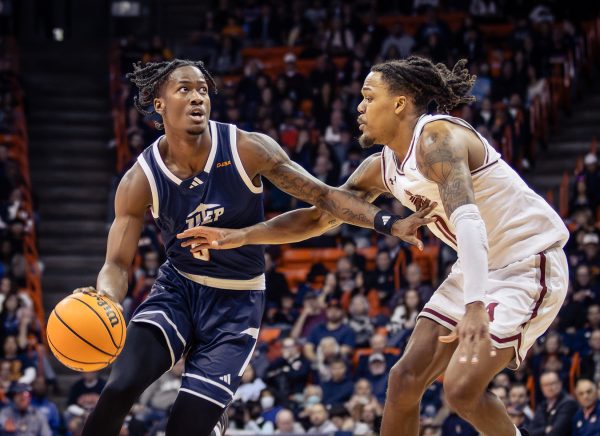 Guard David Terrell protects the ball against New Mexico State player at the Don Haskins Center on Jan. 11.