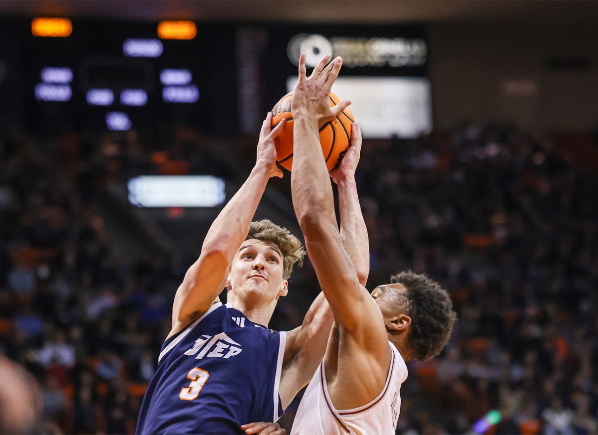 Senior Guard Baylor Hebb attempts to go for a layup at a sold-out Don Haskins against NMSU.