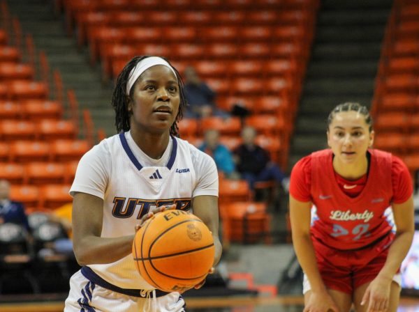 UTEP guard Delma Zita (5) shooting at the free throw line.