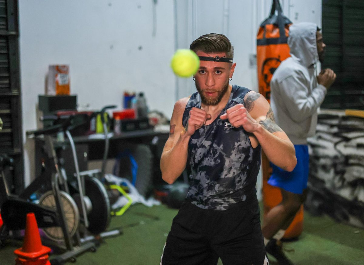 Alec McGee focuses on Precision Training practicing with a tennis ball.