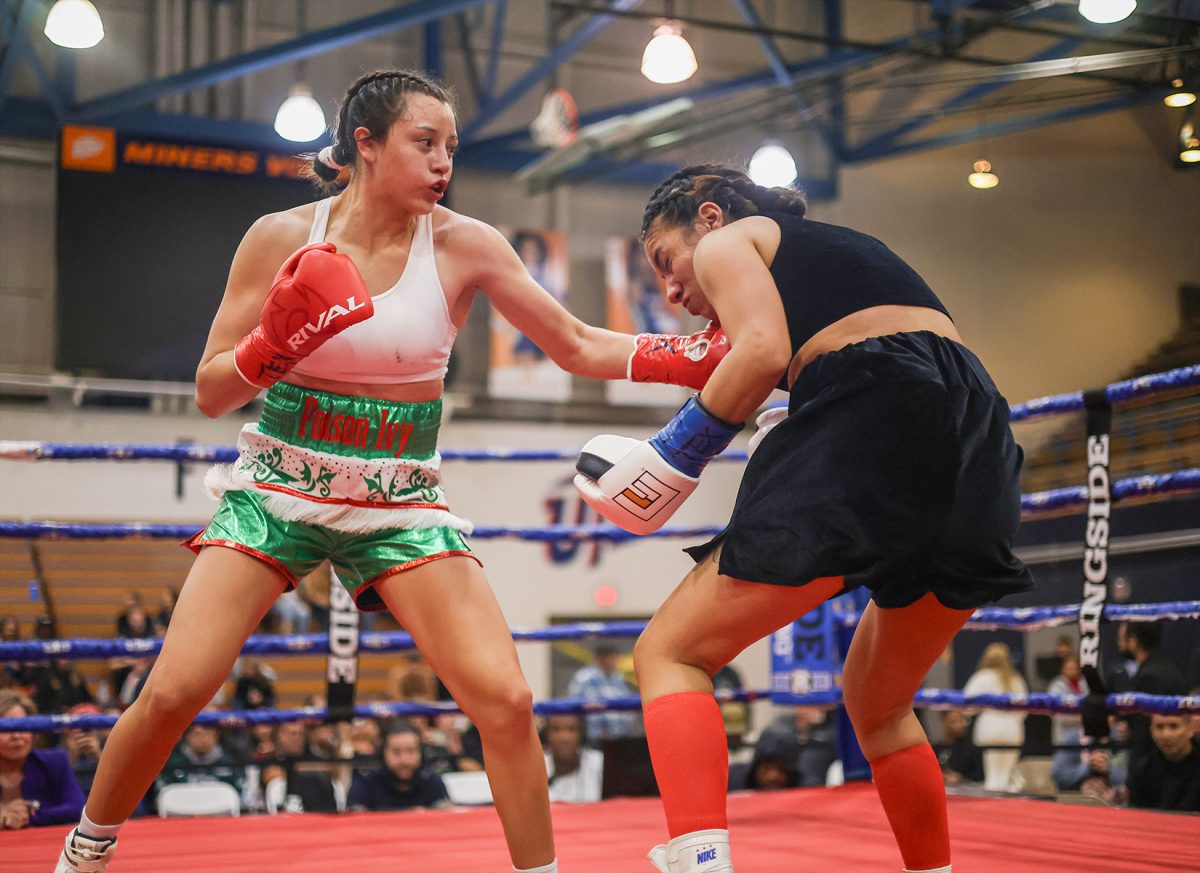 “Poison Ivy” Enriquez delivers a jab at Karla Valenzuela Garcia at UTEP’s Memorial Gym.