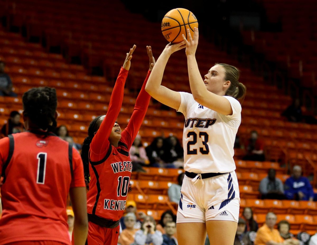 Sophomore forward Luisa Vydrova shoots from mid-range on the court.