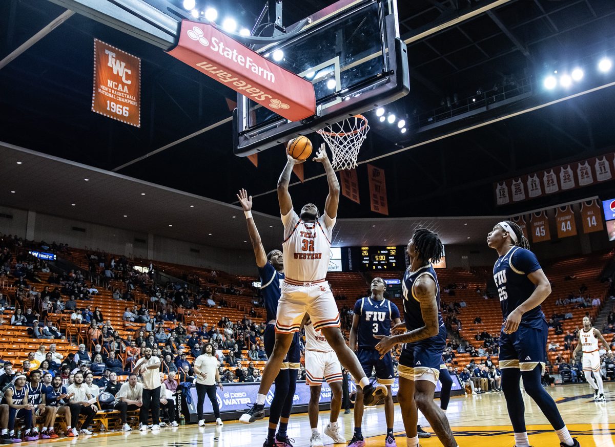 Senior forward Derick Hamilton attempts to dunk the ball. Hamilton shot a total of 8 points against FIU.