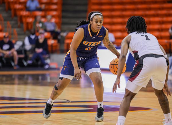 Junior guard Portia Adams sizes up a defender as she looks to make a move during the matchup against NMSU at the Don Haskins Center.