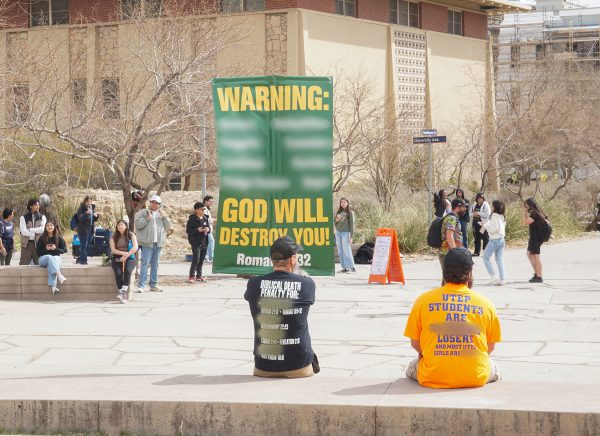 A crowd of students gather around the Christian protestors at the University of Texas at El Paso (UTEP).