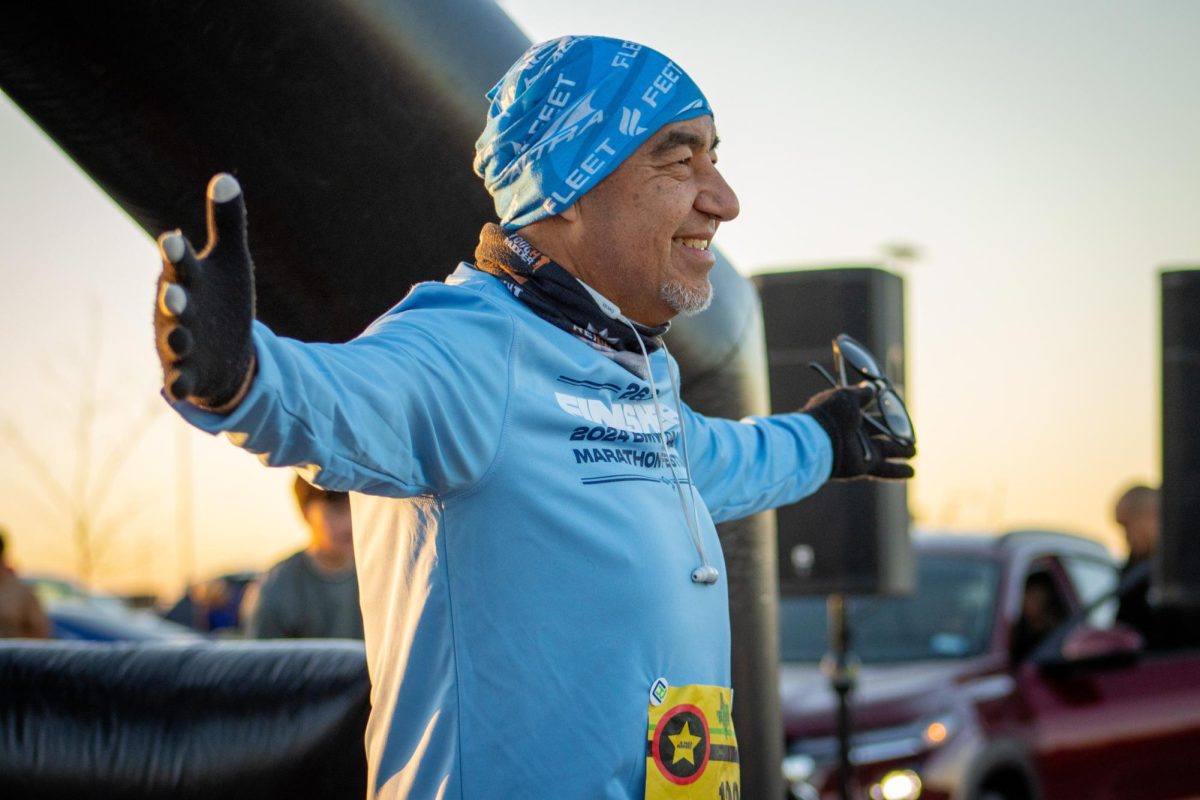 A marathoner captures the moment smiling with excitement at the start line of the Michelob Ultra El Paso Marathon.