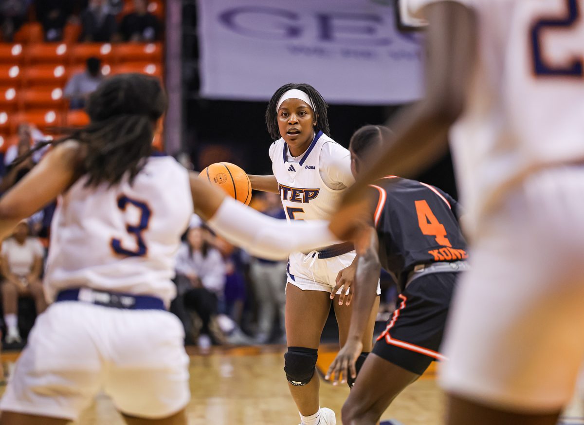 Senior guard Delma Zetia surveys the court as she looks to set up a play against Sam Houston on March 6.