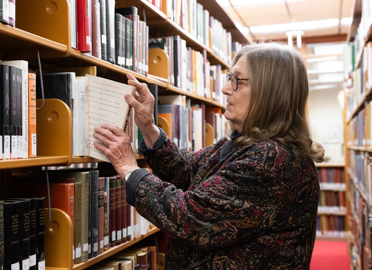 Claudia Rivers, a dedicated archivist, continues her mission to document and preserve the rich history of the borderland for future generations.